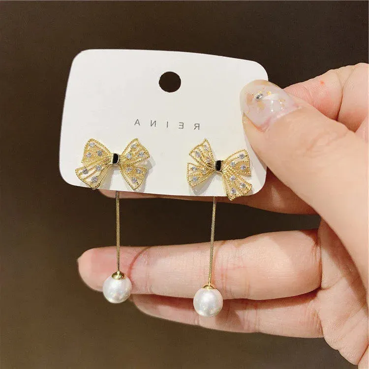 Inlaid Rhinestone Bow Tassel Earrings