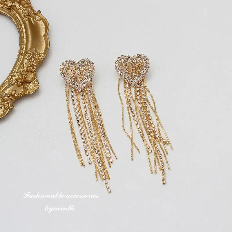 Inlaid Rhinestone Bow Tassel Earrings