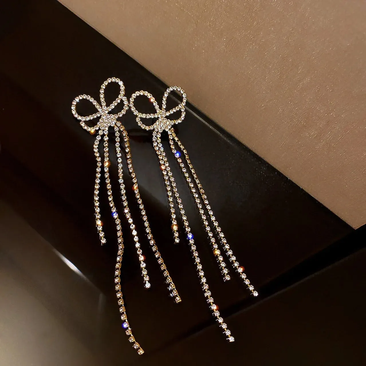 Inlaid Rhinestone Bow Tassel Earrings