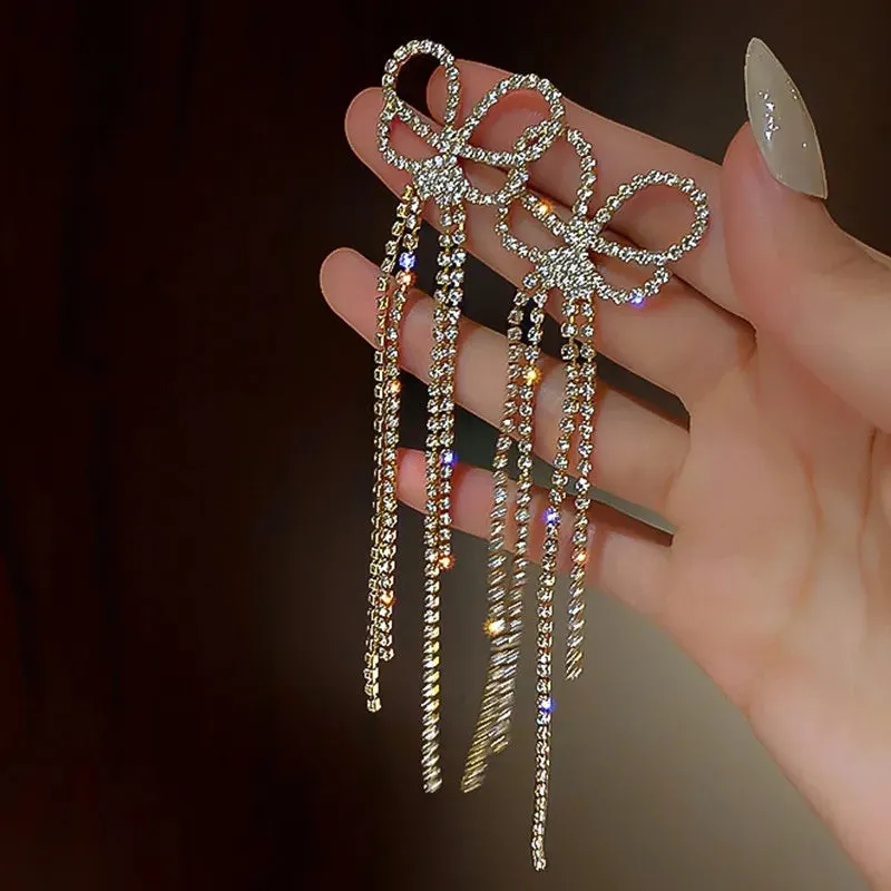 Inlaid Rhinestone Bow Tassel Earrings