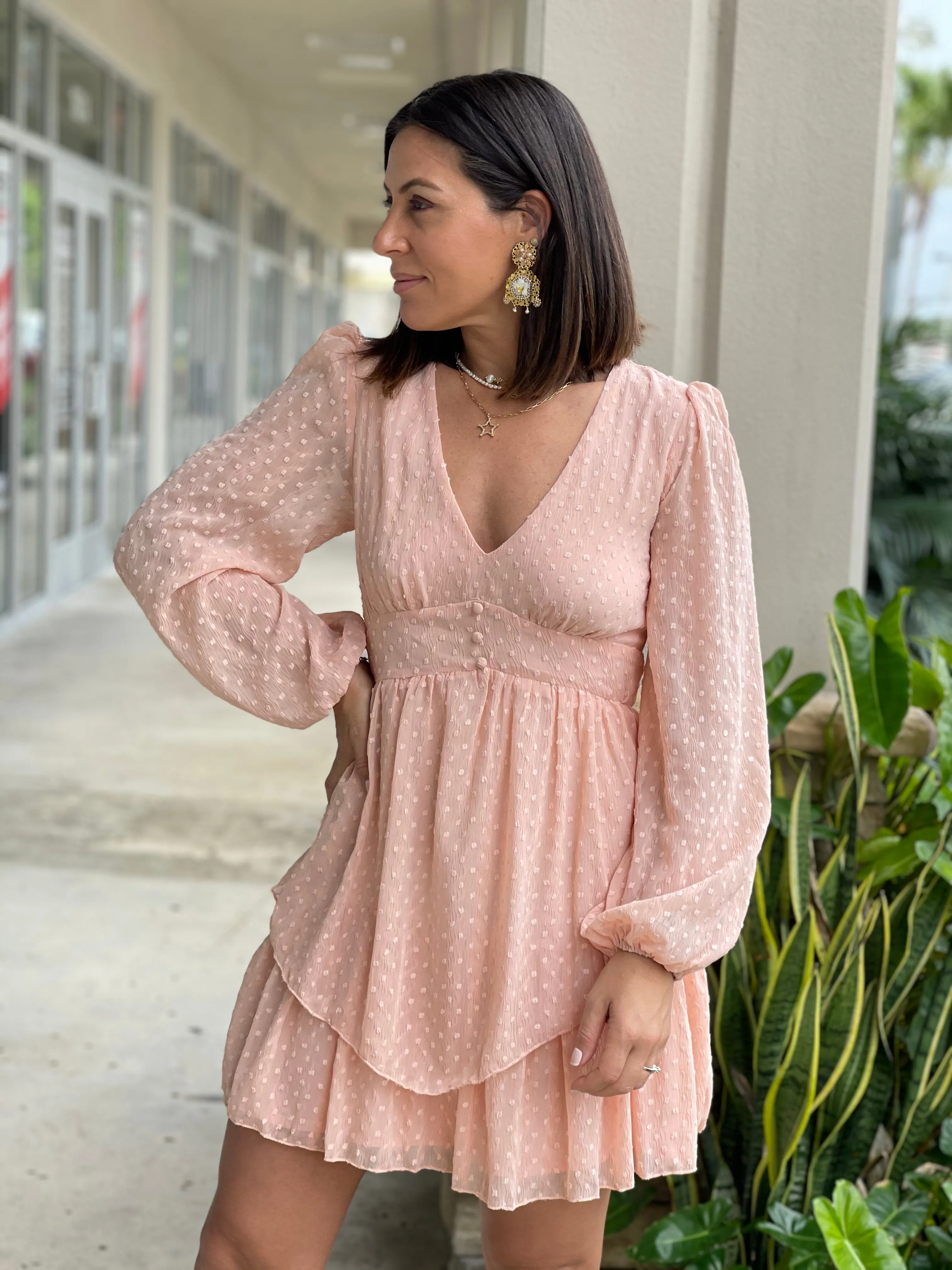 Textured feminine short dress with baggy long sleeves.