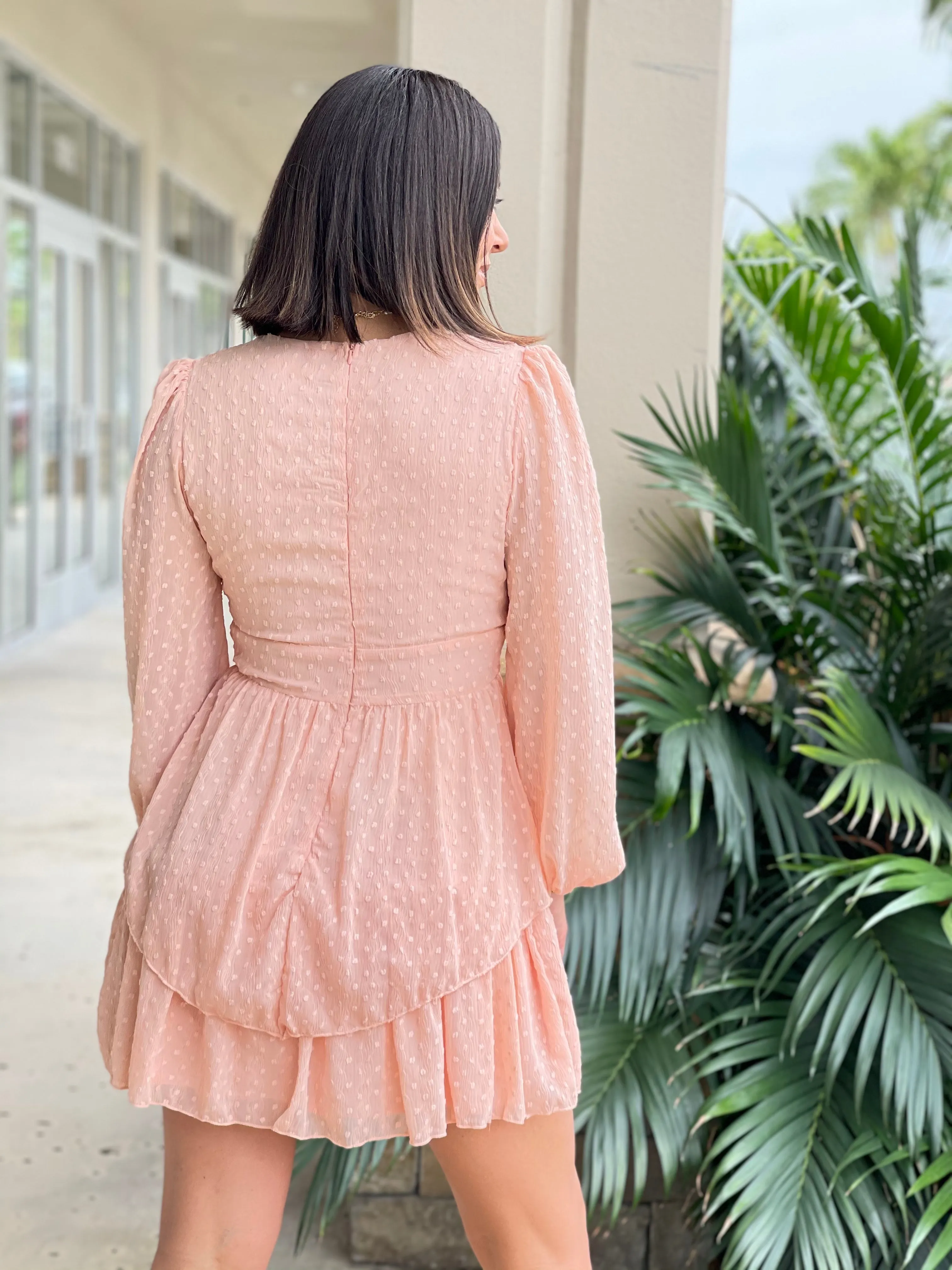 Textured feminine short dress with baggy long sleeves.