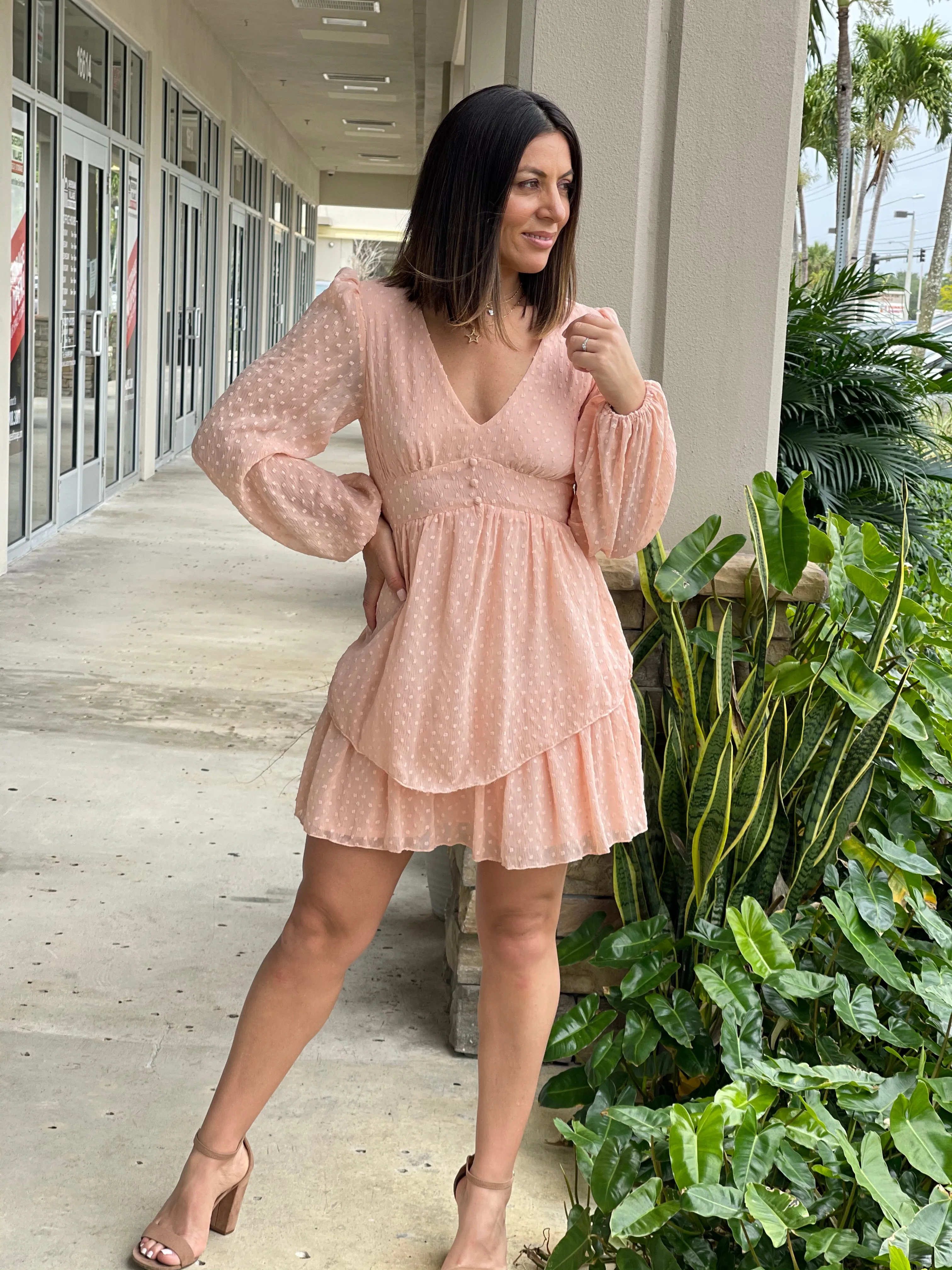 Textured feminine short dress with baggy long sleeves.