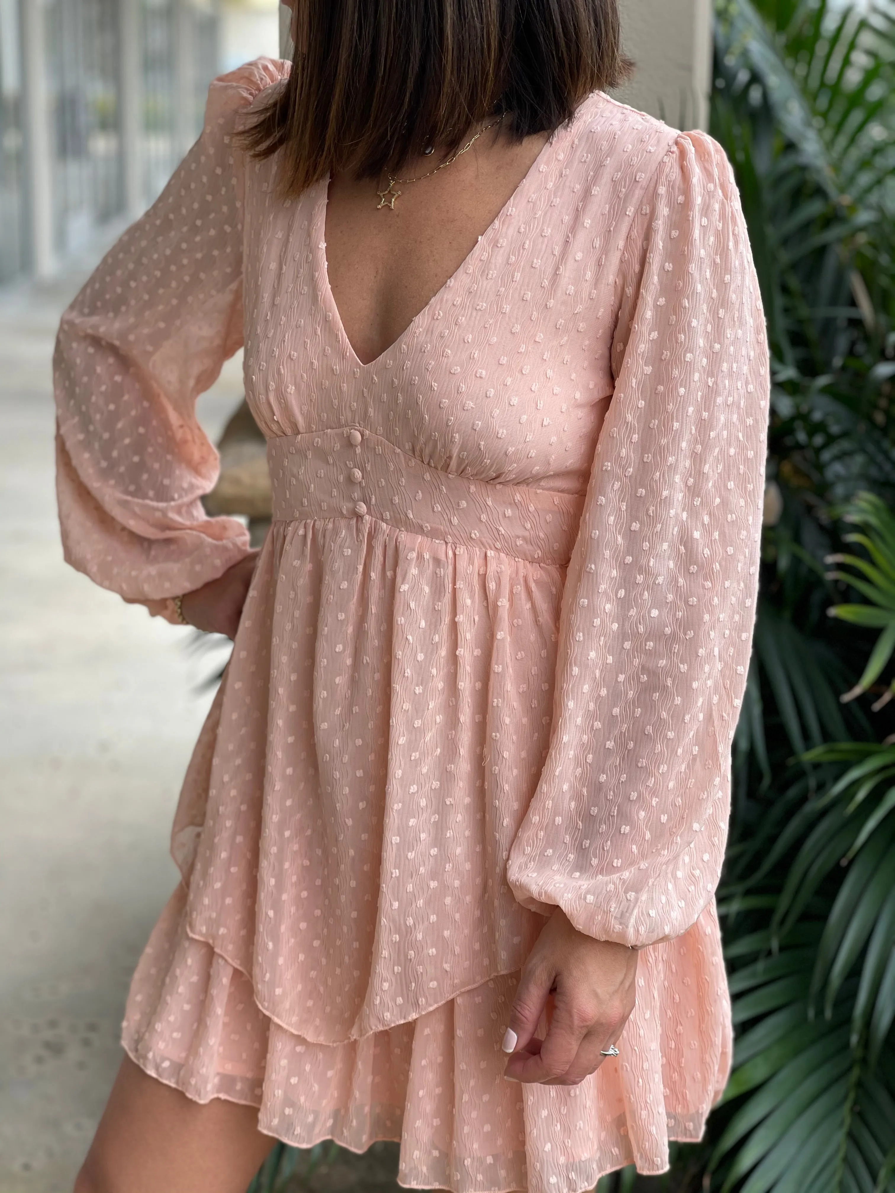 Textured feminine short dress with baggy long sleeves.