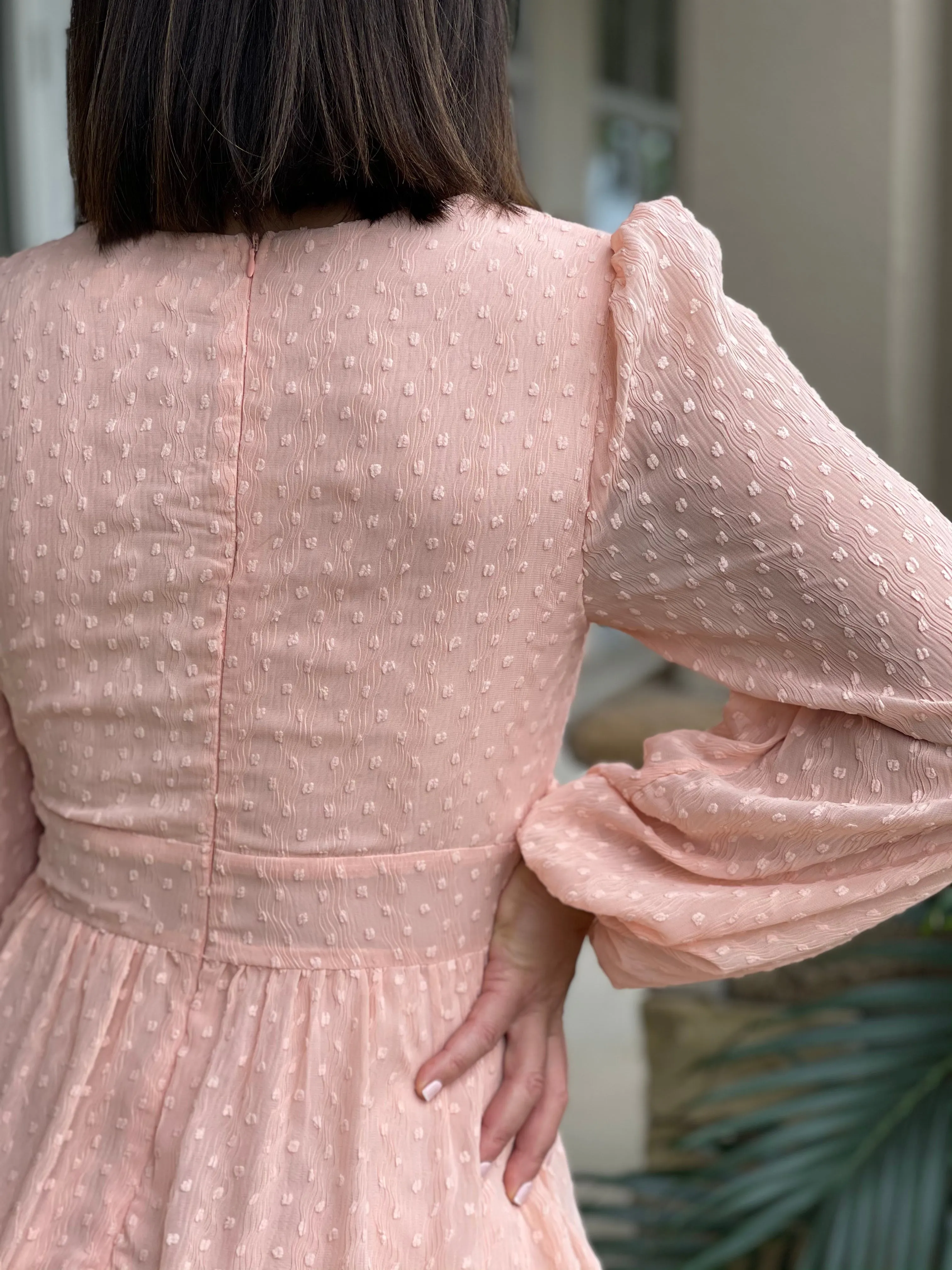 Textured feminine short dress with baggy long sleeves.