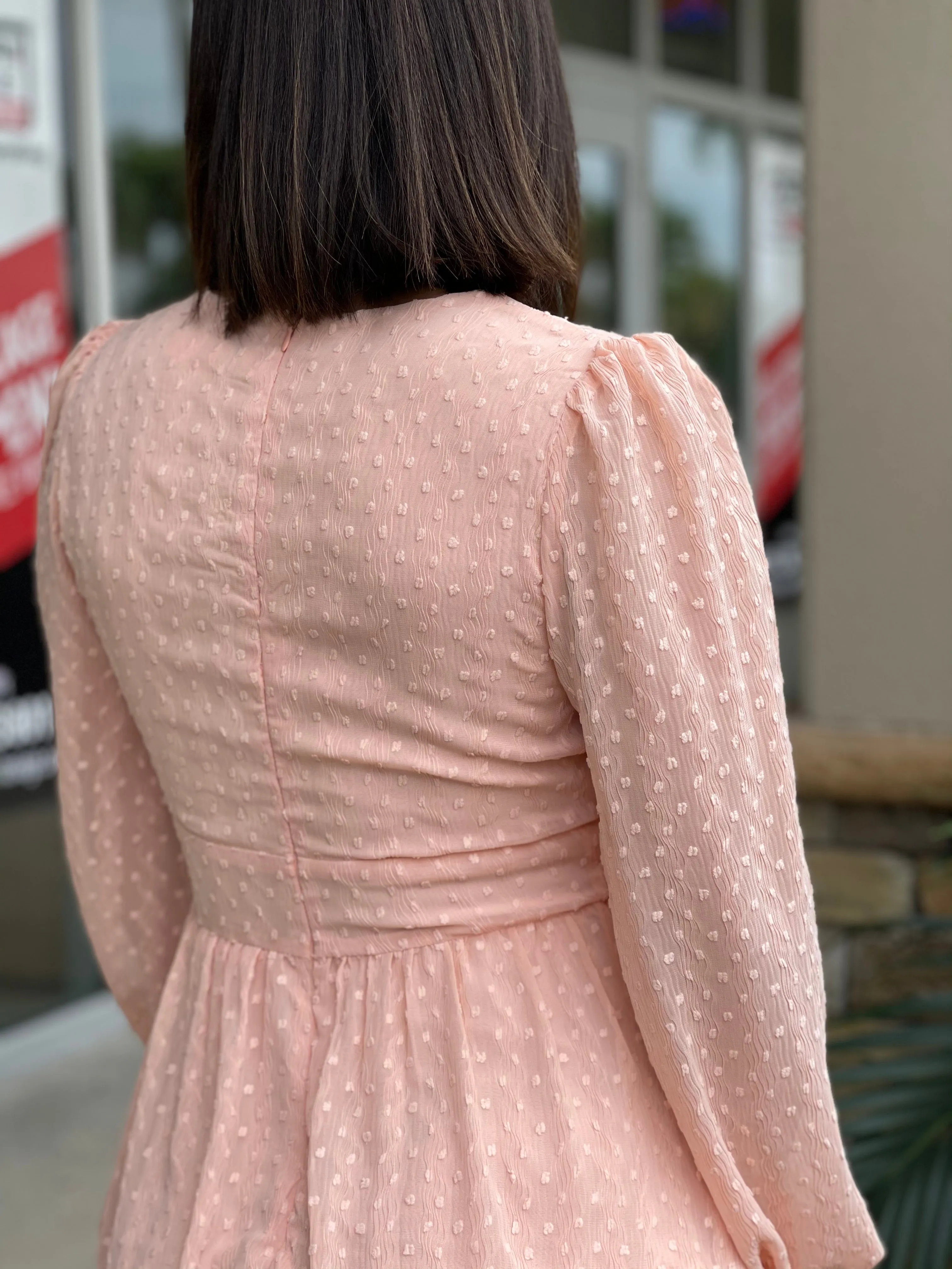 Textured feminine short dress with baggy long sleeves.