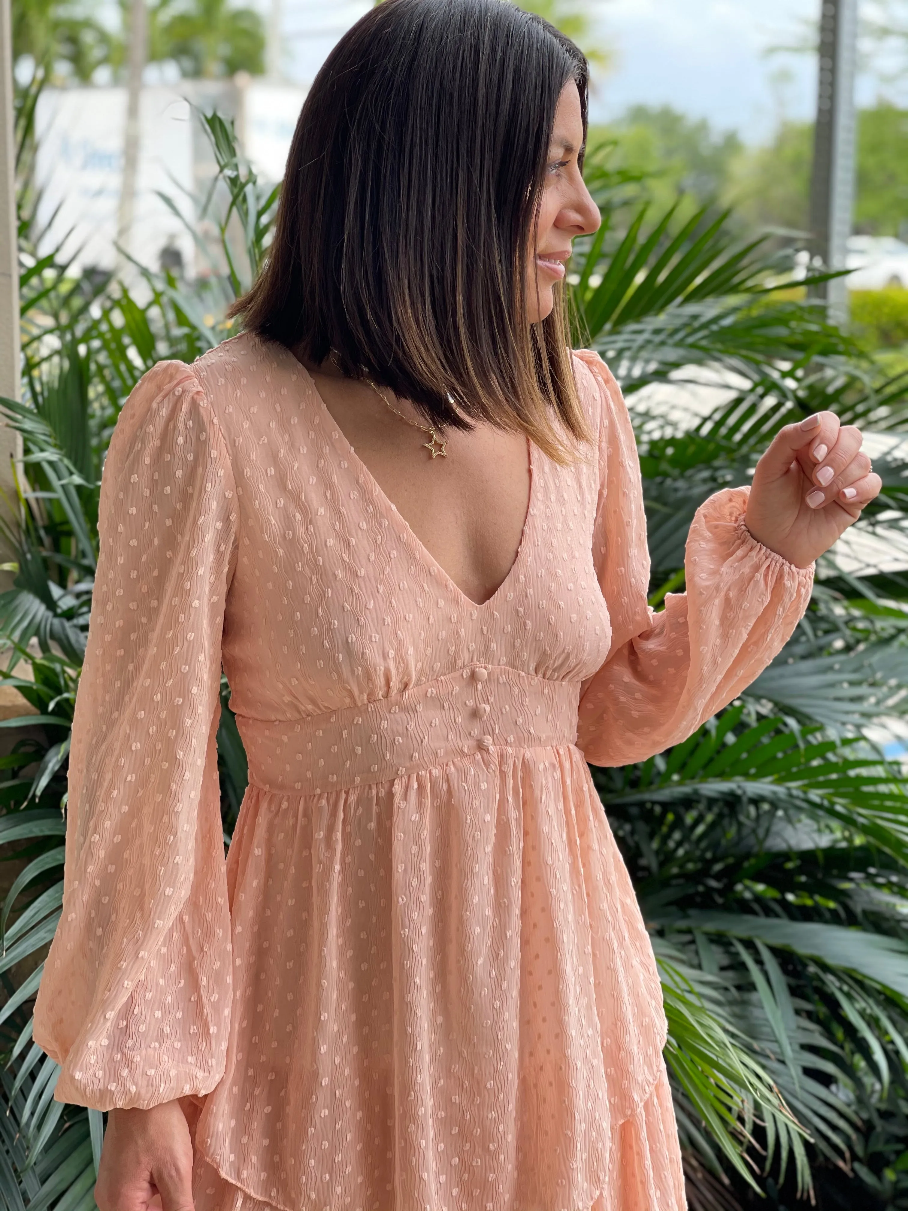 Textured feminine short dress with baggy long sleeves.