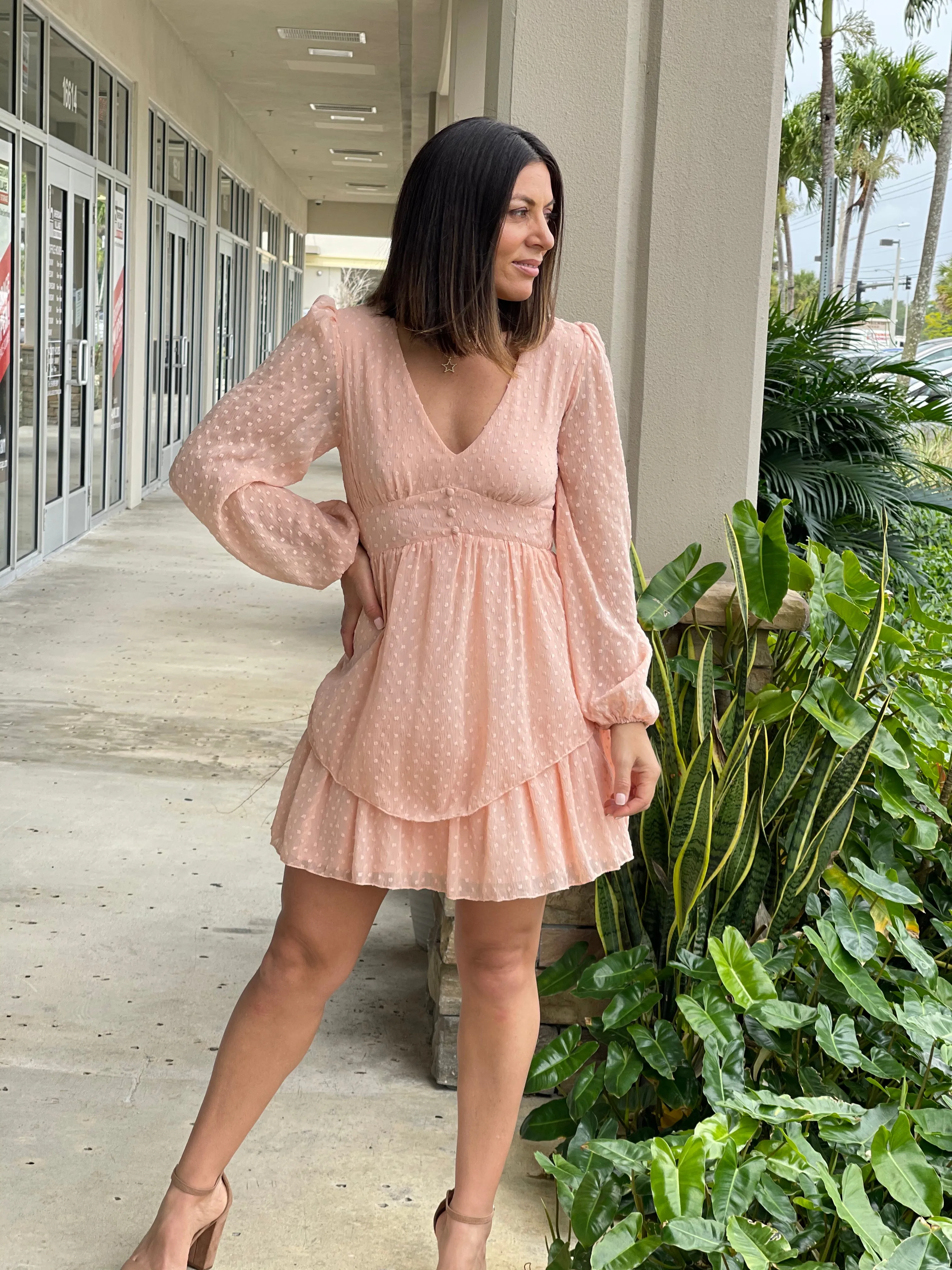 Textured feminine short dress with baggy long sleeves.